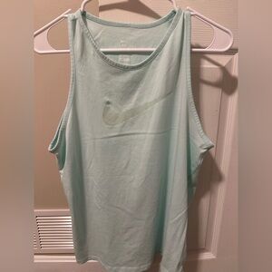 Size Small Nike Dri Fit Tank Top. Great condition! Light teal color